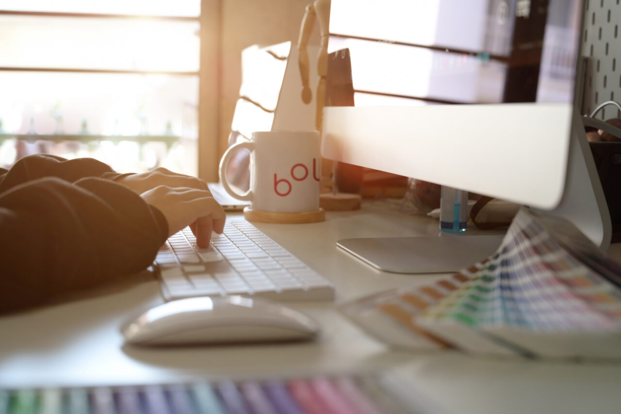 Graphic designer working on creative workspace